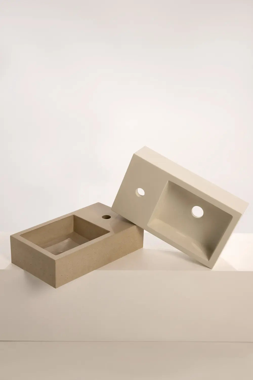 Two concrete rectangular basins showcasing clean geometric design